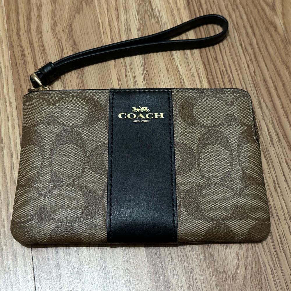 Black and Tan Coach Wristlet